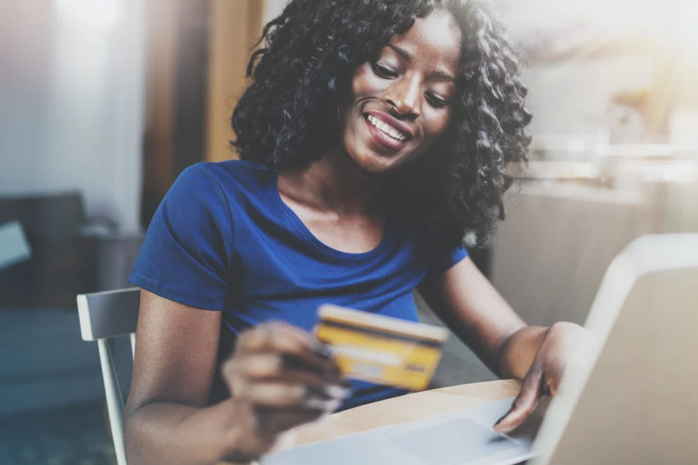 Nigeria: Geopoll Survey and Insights on Adoption of eCommerce, Income and Consumer Behaviour Woman shops online